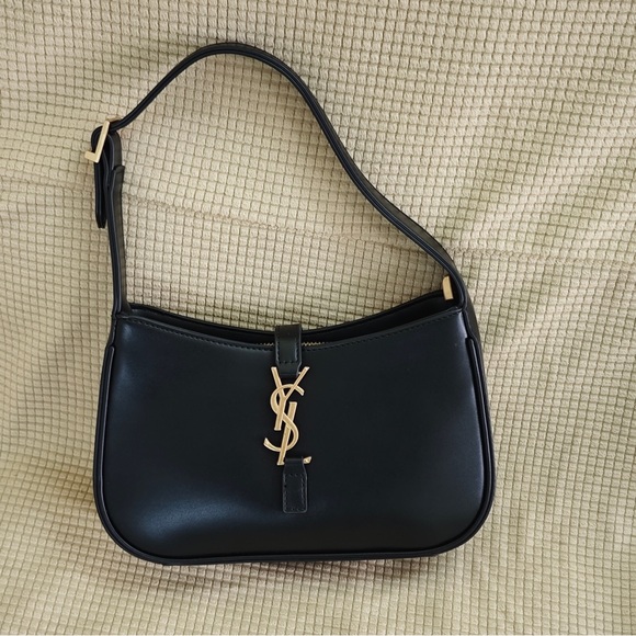 Yves Saint Laurent Elegant Black Shoulder Bag with Gold Logo - Picture 2 of 13